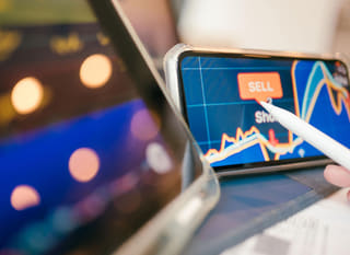Trader engaged in multi-market analysis covering Bitcoin, Ethereum, and forex options